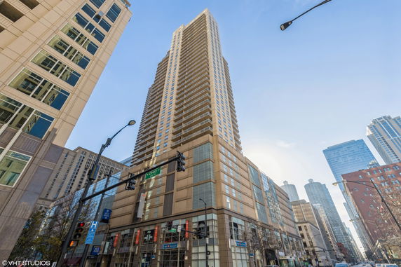 Front view of a high-rise building in an urban setting.