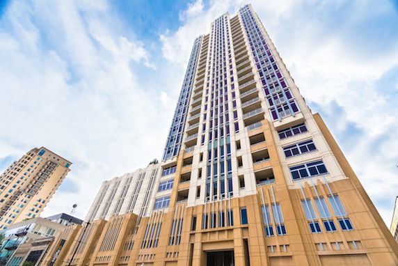 Front view of a tall modern skyscraper building