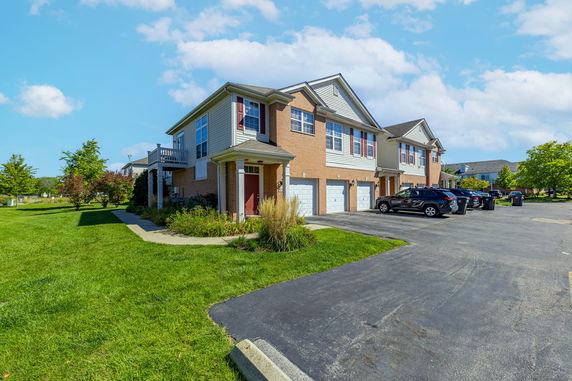 Front view of a two-story house with a double garage.