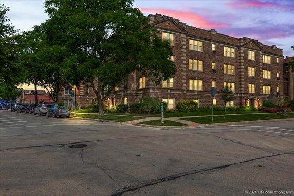 Front view of a multi-story brick building.