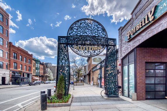 Street view with buildings and an ornate gate labeled 'Old Town'.