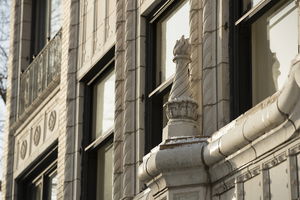 Detailed architectural view of a building facade with decorative features.