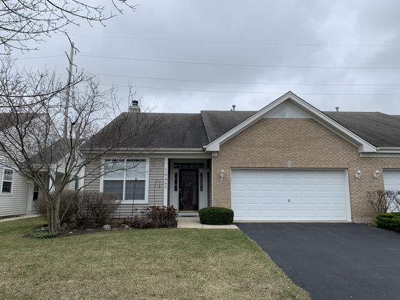 Front view of a single-story house with a double garage.