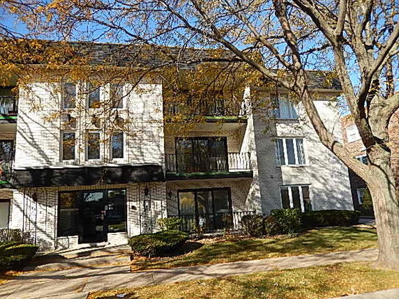 Front view of a multi-story residential building.