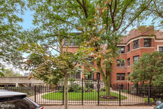 Front view of a multi-story brick building.