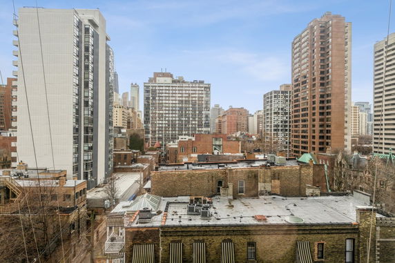 Panoramic view of multiple high-rise buildings in an urban area.