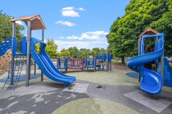 Playground with slides and climbing structures.
