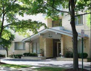 Front view of a multi-story residential building.