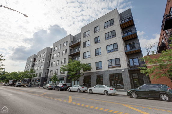 Front view of a multi-story residential building.