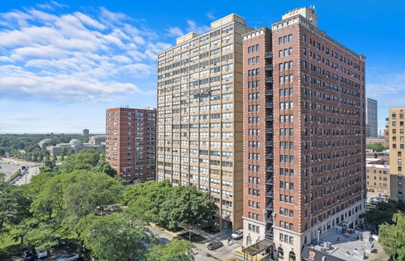 Front view of multiple high-rise apartment buildings.