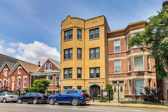 Front view of a multi-story residential building.