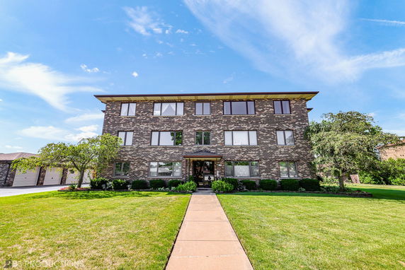 Front view of a three-story brick building