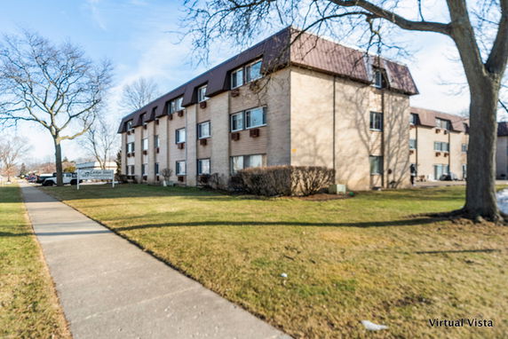 Front view of a three-story apartment building