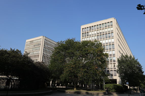 Front view of two multi-story office buildings.