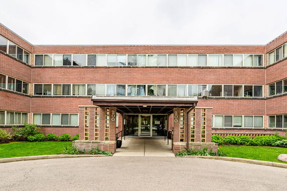 Front view of a multi-story brick building.