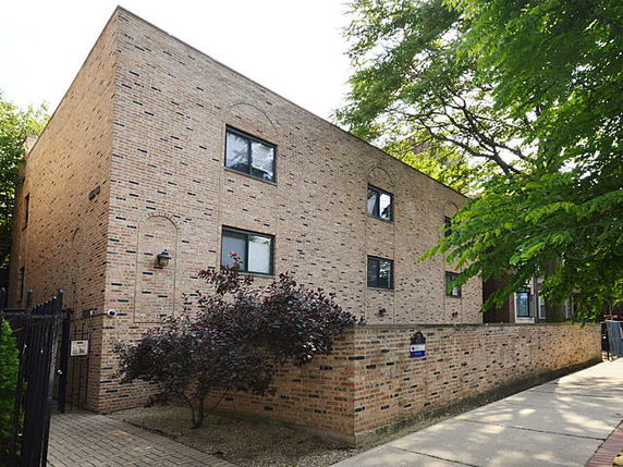 Front view of a two-story brick building.
