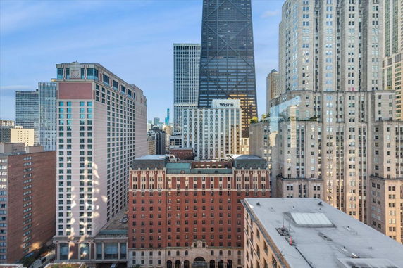 Panoramic view of tall buildings in a cityscape.