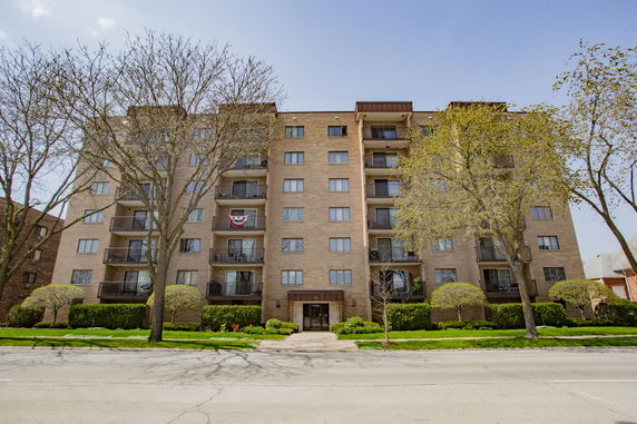 Front view of a multi-story residential building.