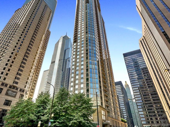 Front view of multiple high-rise buildings in an urban setting.