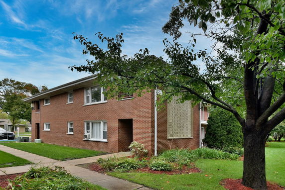 Front view of a two-story brick building.