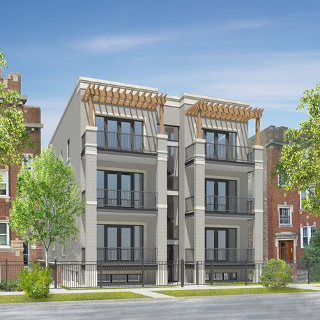 Front view of a modern multi-story building with balconies.