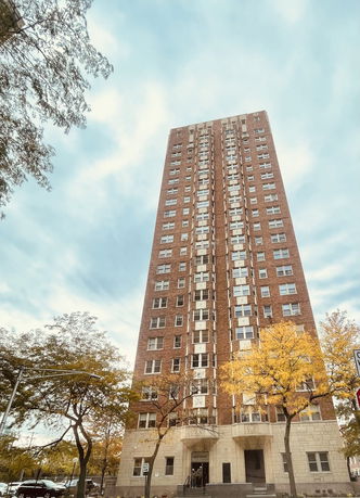 Front view of a tall residential building.