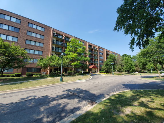Front view of a multi-story apartment building.