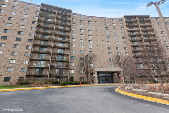 Front view of a multi-story apartment building.