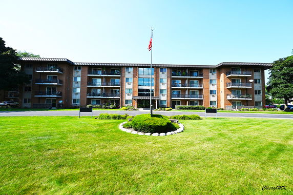 Front view of a multi-story apartment building.