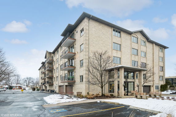Front view of a multi-story apartment building.