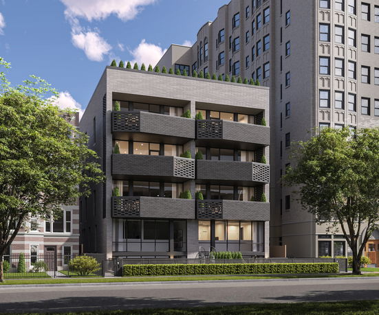 Front view of a modern multi-story apartment building with balconies.