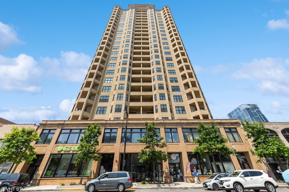 Front view of a multi-story high-rise building.