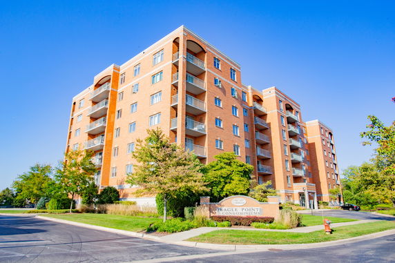 Front view of a multi-story condominium building.