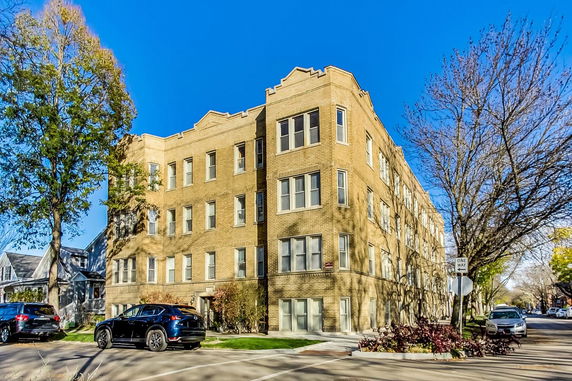 Front view of a multi-story brick building.