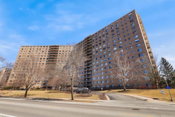 Front view of a multi-story residential building.