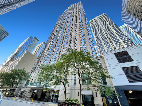 Front view of a high-rise building with numerous windows.