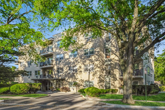 Front view of a multi-story apartment building.