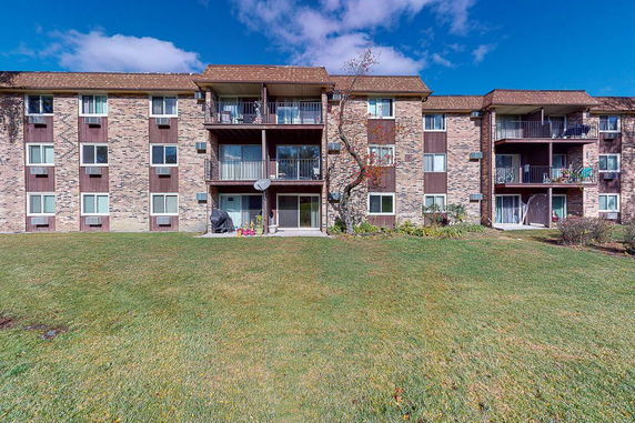 Front view of a three-story apartment building.
