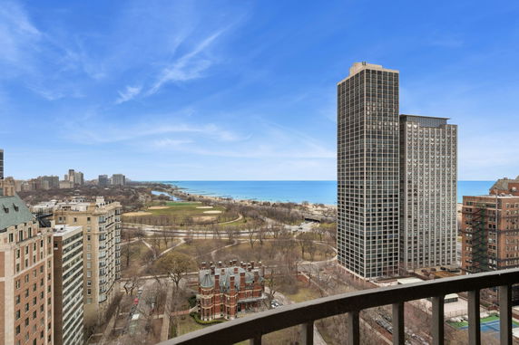 Panoramic view of buildings and a distant shoreline.