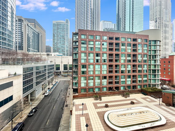 Panoramic view of urban buildings with various modern architectural designs.