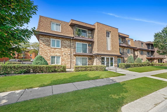 Front view of a multi-story apartment building.