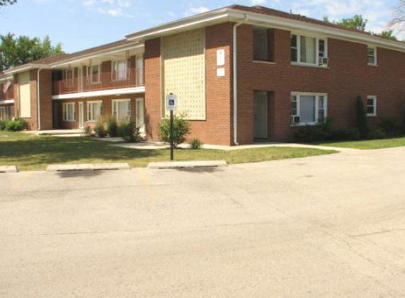 Front view of a two-story brick building.