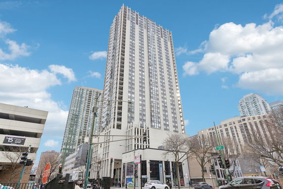 Front view of a high-rise building in an urban area.