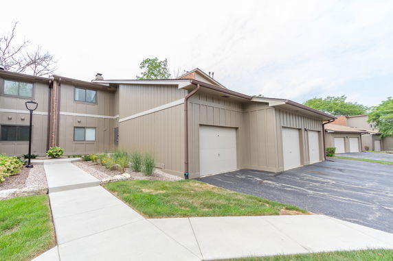 Front view of a building with multiple garages.