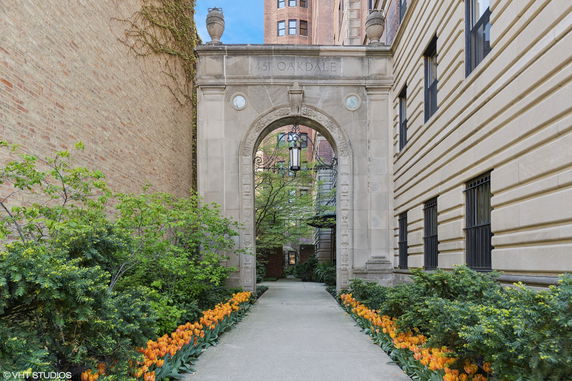 Front view of a decorative archway entrance to a building.