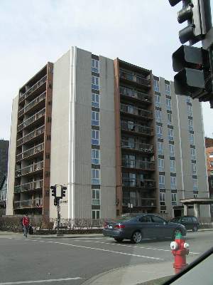 Front view of a multi-story apartment building.