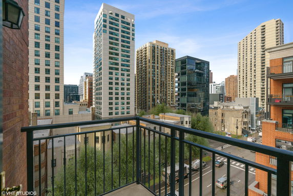 View of surrounding urban buildings from a balcony.
