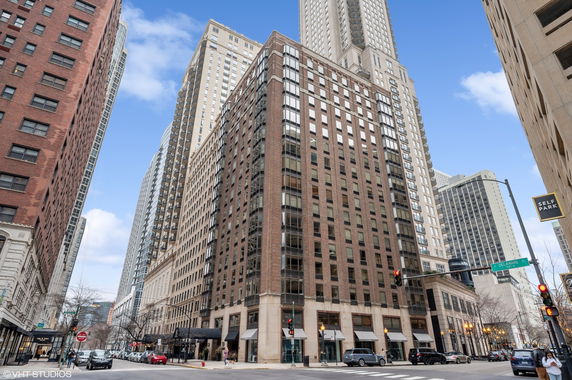Front view of a multi-story commercial building in an urban setting.