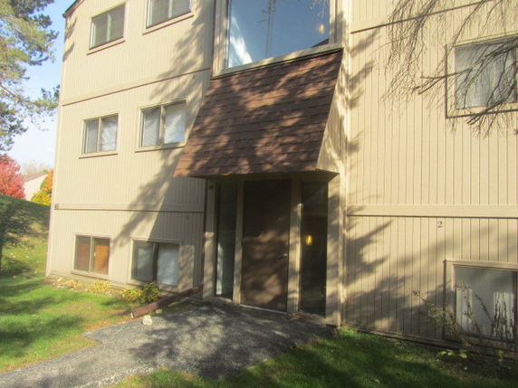Front view of a multi-story building entrance.