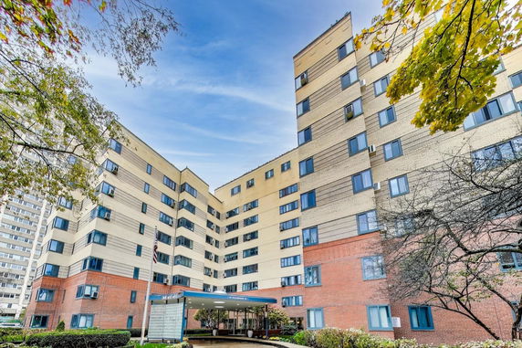 Front view of a multi-story apartment building.